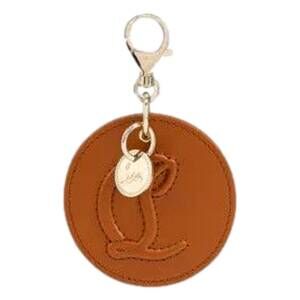 NEW CHRISTIAN LOUBOUTIN women's round leather logo bag charm keychain in brown